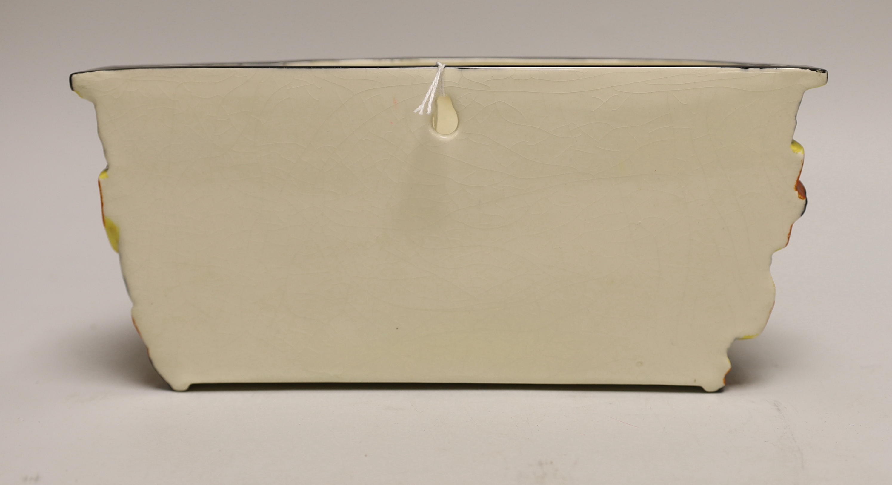 A Clarice Cliff wall vase 26cm wide